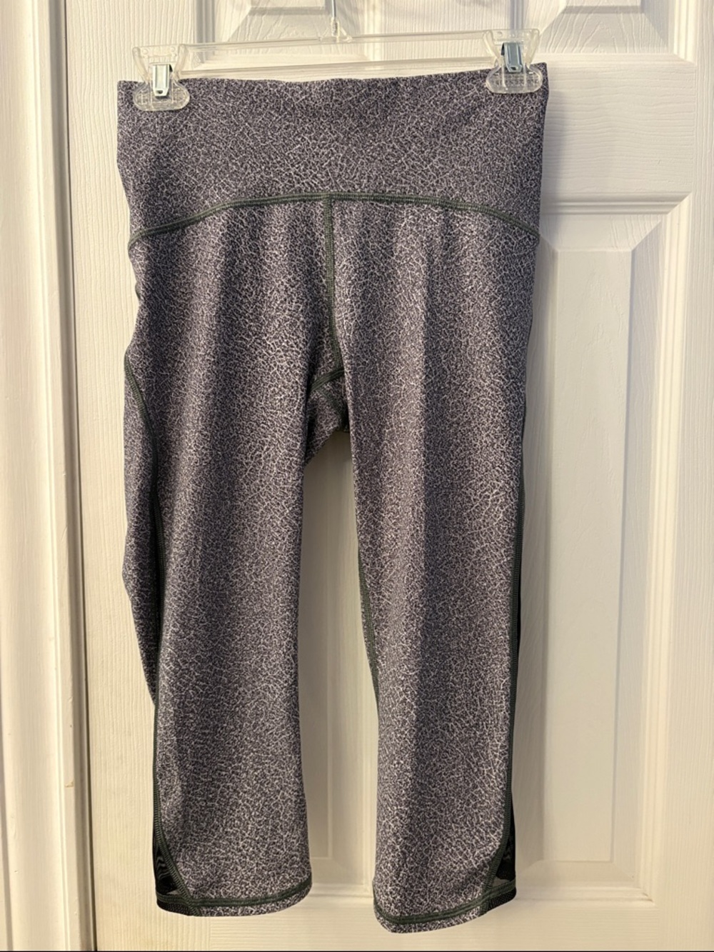 Lululemon athletica gray speckled Capri Leggings, sheer black side panel. Size 6